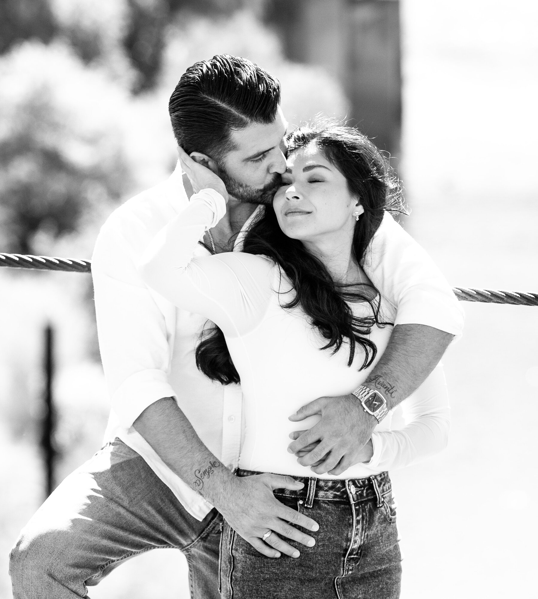 Black and white photograph of a couple embracing